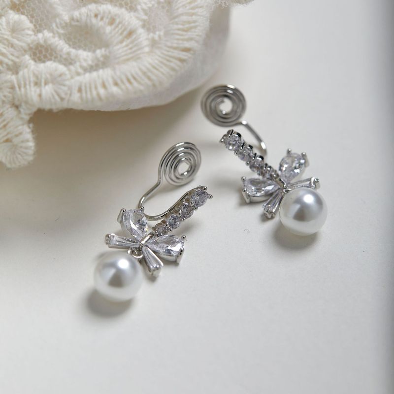 【Precious Thousand Gold】Sweet and cute bow pearl simple temperament earrings without pierced ears clip mosquito coil disc