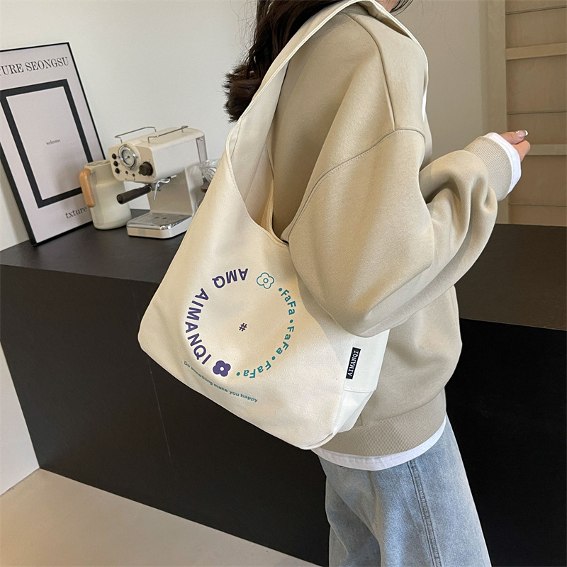 Ins style letter printed canvas armpit bag large capacity spring and summer Ruiying shoulder women's bag middle school student backpack
