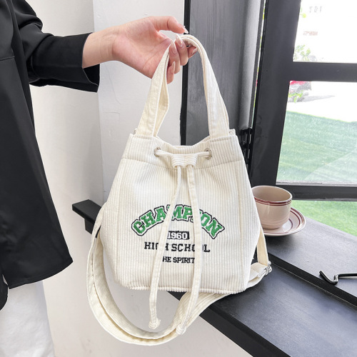 Niche design nylon women's bag college style large capacity bucket bag texture fashion portable shoulder bag wholesale