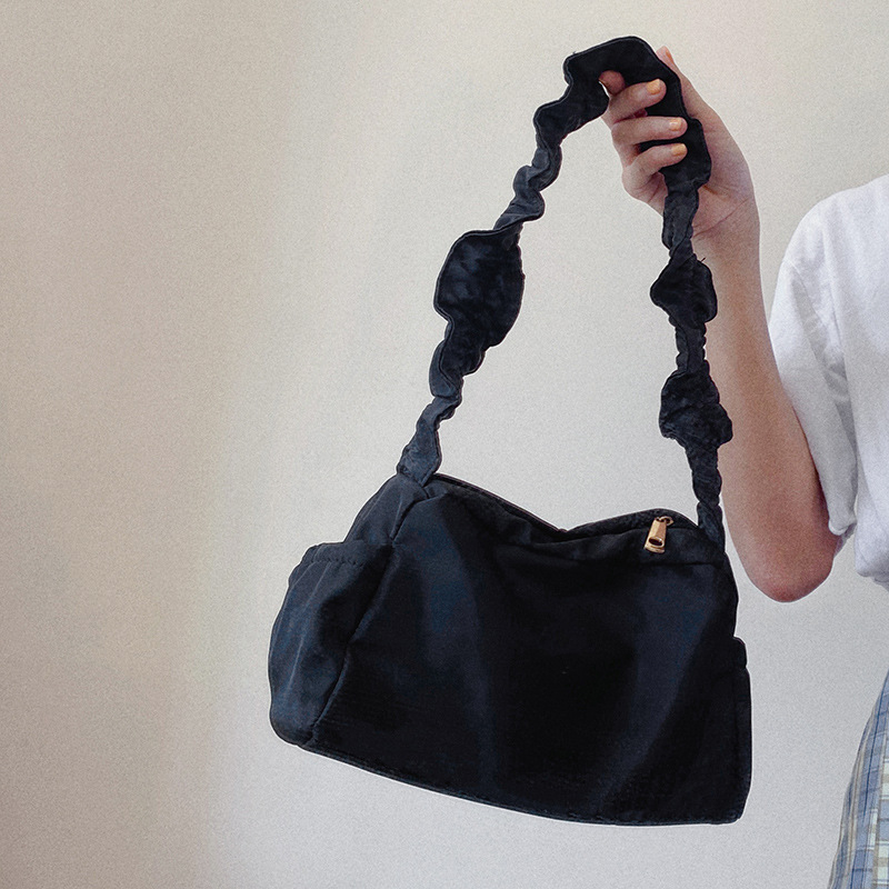 Nylon pleated design handbag simple solid color dark retro baguette bag new women's shoulder armpit bag