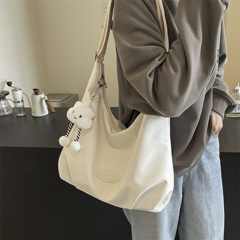 Simple and cute tote bag, high-end large-capacity crossbody bag for women, versatile summer niche design shoulder commuter bag