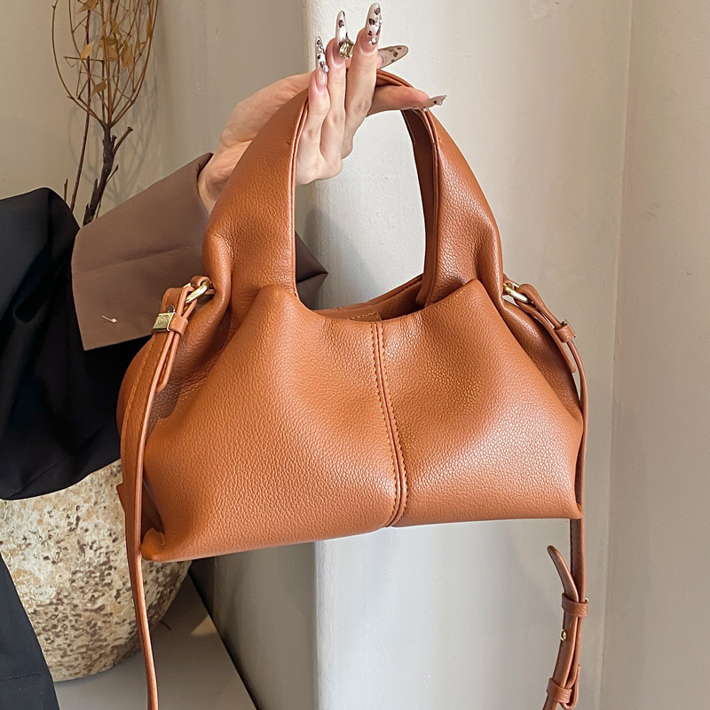 Wholesale women's cloud dumpling bag 2024 new popular portable lunch box bag French texture single shoulder crossbody bag for women