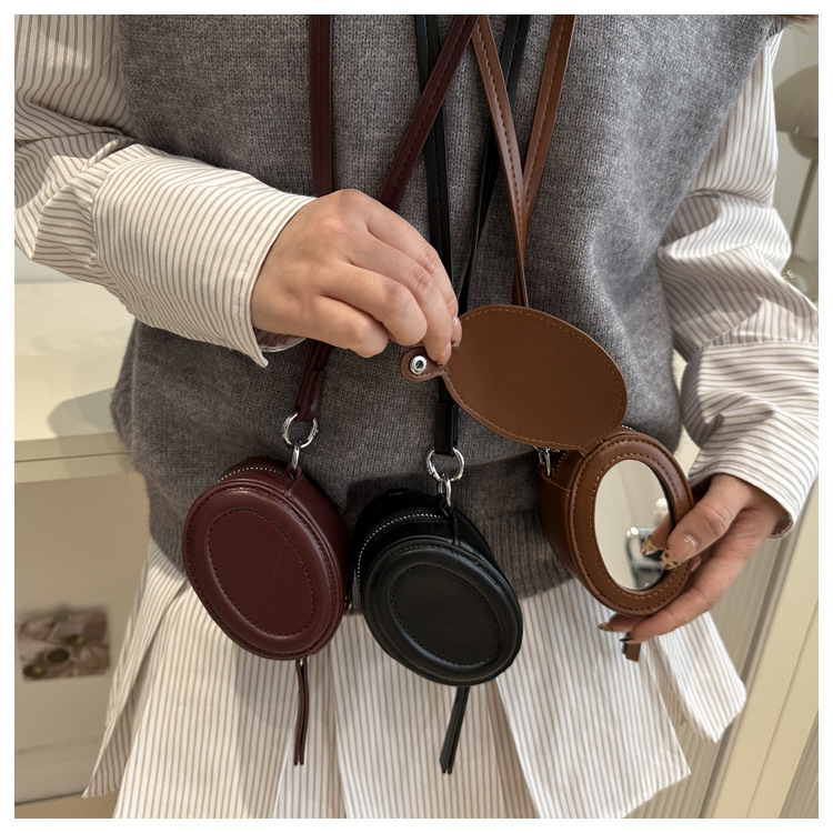 European and American retro oval women's box bag solid color flip with makeup mirror lipstick halter bag mini crossbody bag