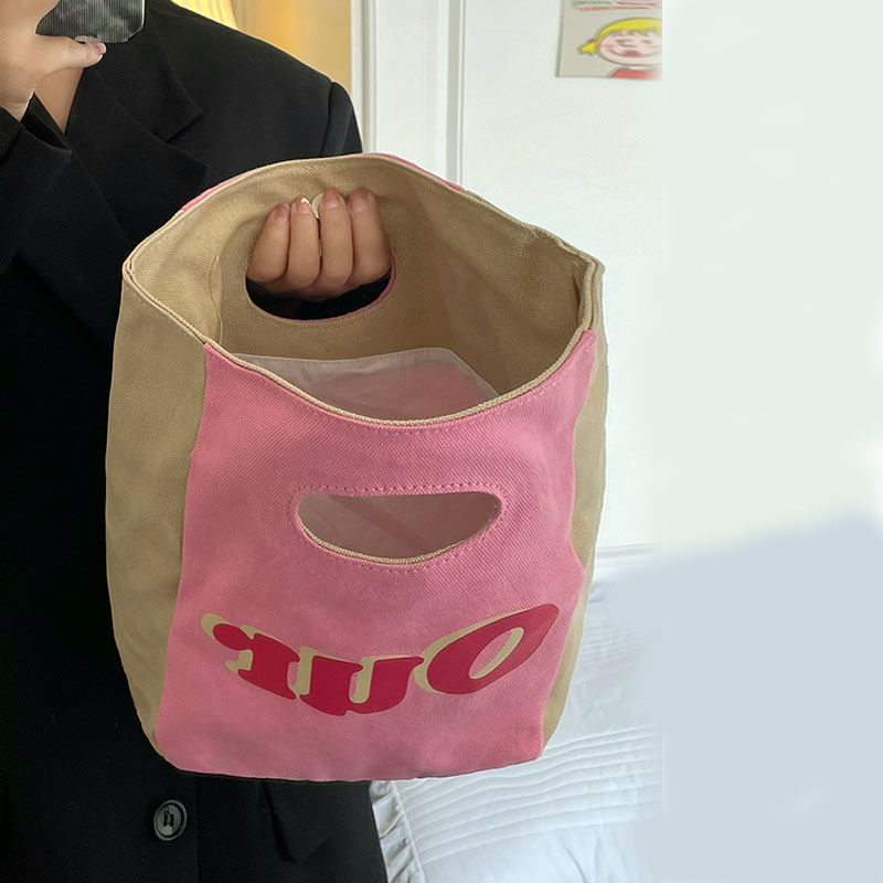 Niche design cute clutch bag tote bag casual commuting lunch box bag cosmetic bag storage bag for women