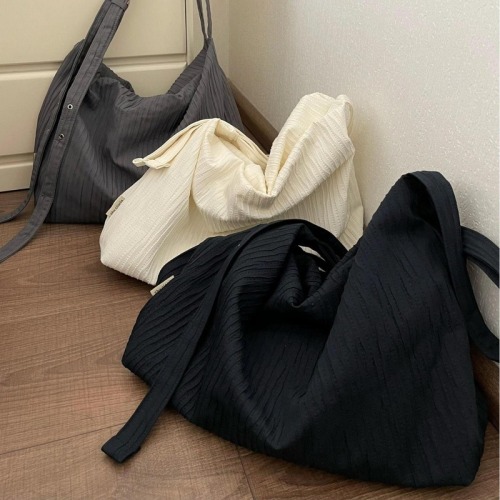 Korean niche texture striped backpack women's large-capacity commuting loose wandering bag student single shoulder crossbody bag