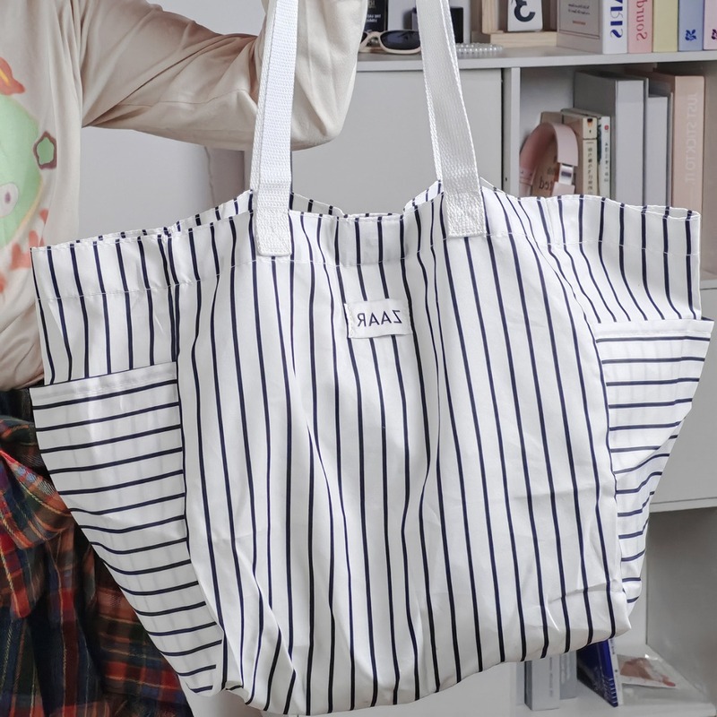 Niche simple portable shoulder bag for women 2024 new style Japanese striped lazy wind canvas bag large capacity shopping bag