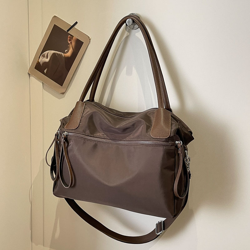Cross-border large-capacity portable 2024 bag Korean style casual lazy style nylon cloth solid color simple commuter shoulder bag