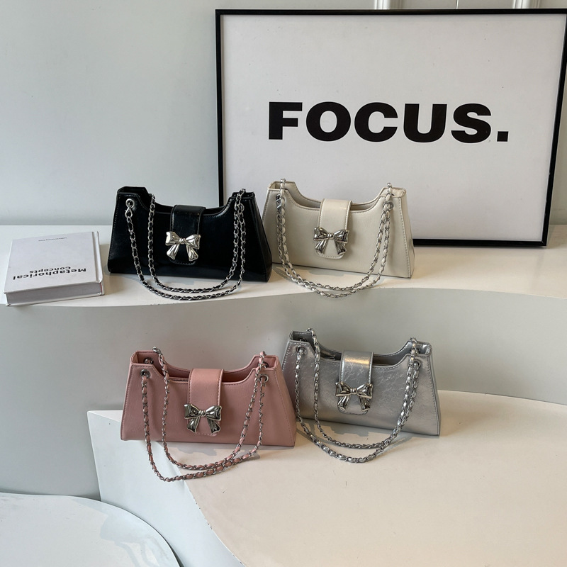 Textured fashionable bow 2024 new spring simple solid color crossbody one-shoulder armpit handbag for women