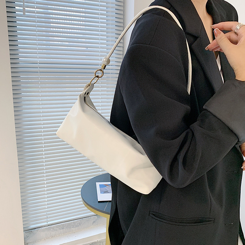 Underarm bag for women summer new ins small fresh sweet versatile soft leather simple pearl shoulder baguette bag