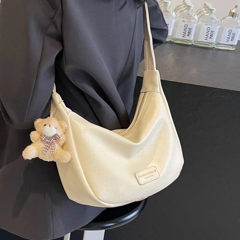 Casual and versatile dumpling bag, fashionable hand scratched small bag, women's 2024 new spring commuting single shoulder crossbody small bag