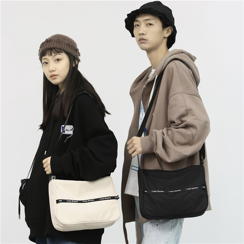 Hong Kong style Harajuku couple shoulder bag ins Japanese fashion casual letter crossbody bag female simple solid color messenger bag