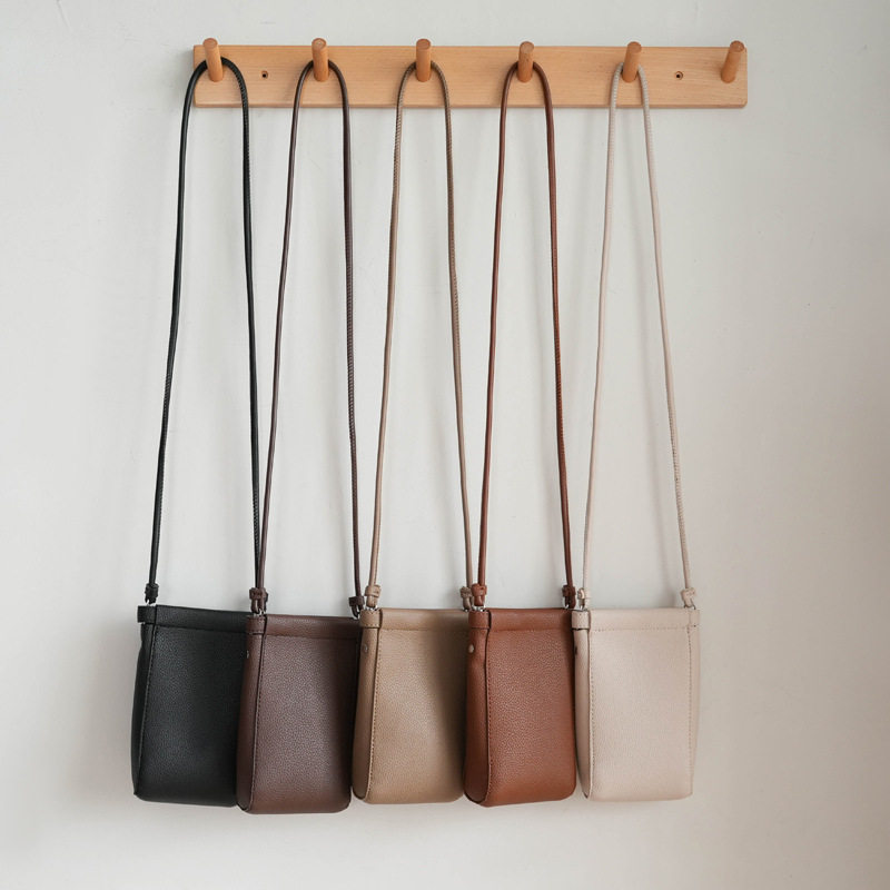New fashion simple small shoulder bag Korean version vertical mobile phone bag female ins Japanese style mini cross-body bag