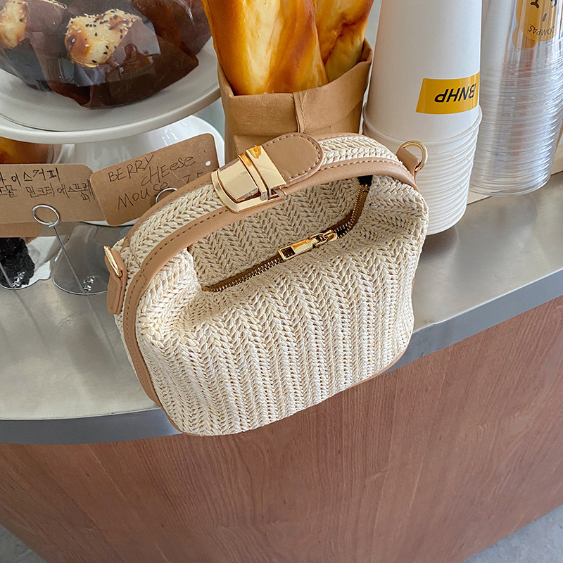 Korea Dongdaemun ins grass woven small bag casual women's bag hand-held shoulder crossbody bag summer new style