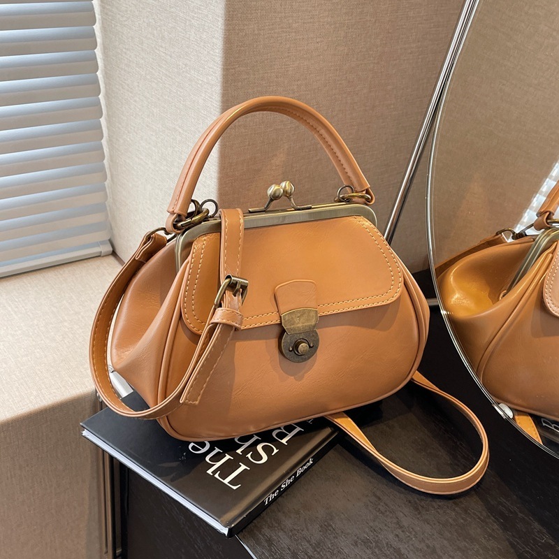 High-end simple hand bag for women 2024 new retro fashion one-shoulder shell bag niche clip crossbody bag