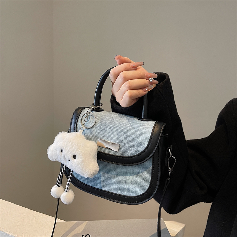 High-end niche design bag for women 2024 new fresh portable crossbody bag fashionable contrasting color semi-circle saddle bag
