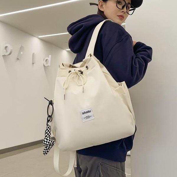 New dual-purpose small backpack casual niche bestie style portable shoulder bag Japanese and Korean drawstring commuter backpack