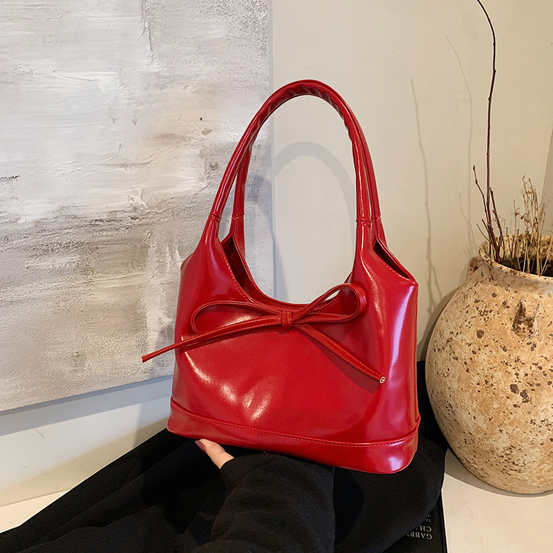 Versatile bow armpit large bag for women 2024 new fashion oil wax leather commuter bag autumn and winter texture tote bag