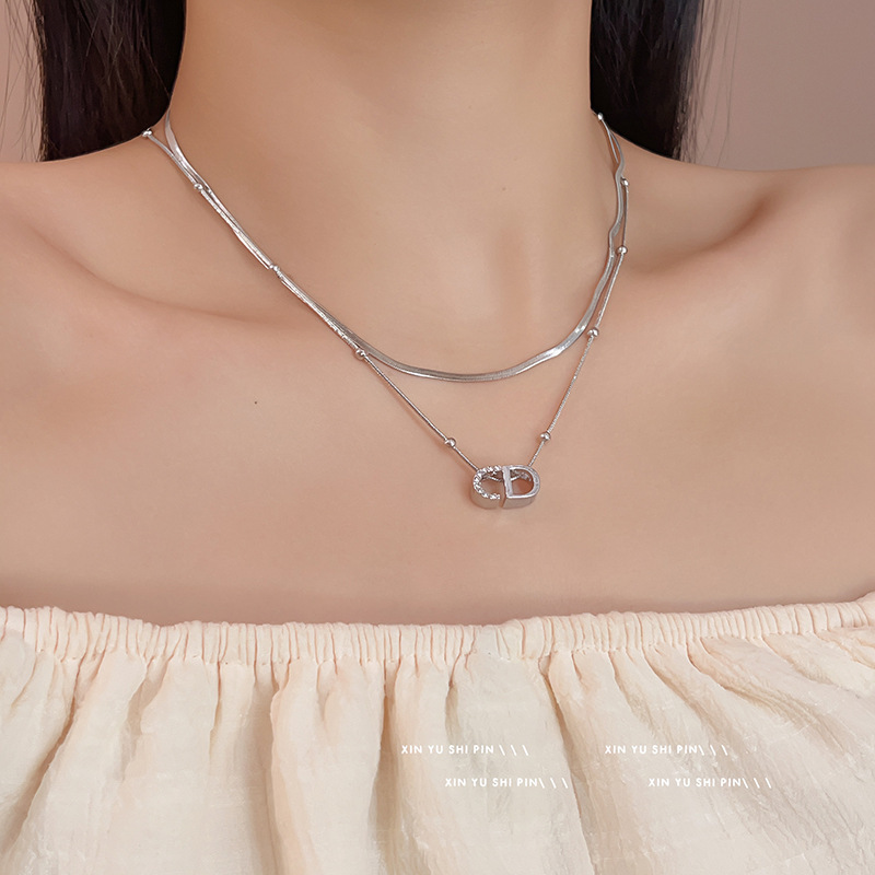 Double-layer stacked CD letter necklace 2024 new niche personalized clavicle chain high-end snake bone chain necklace accessories