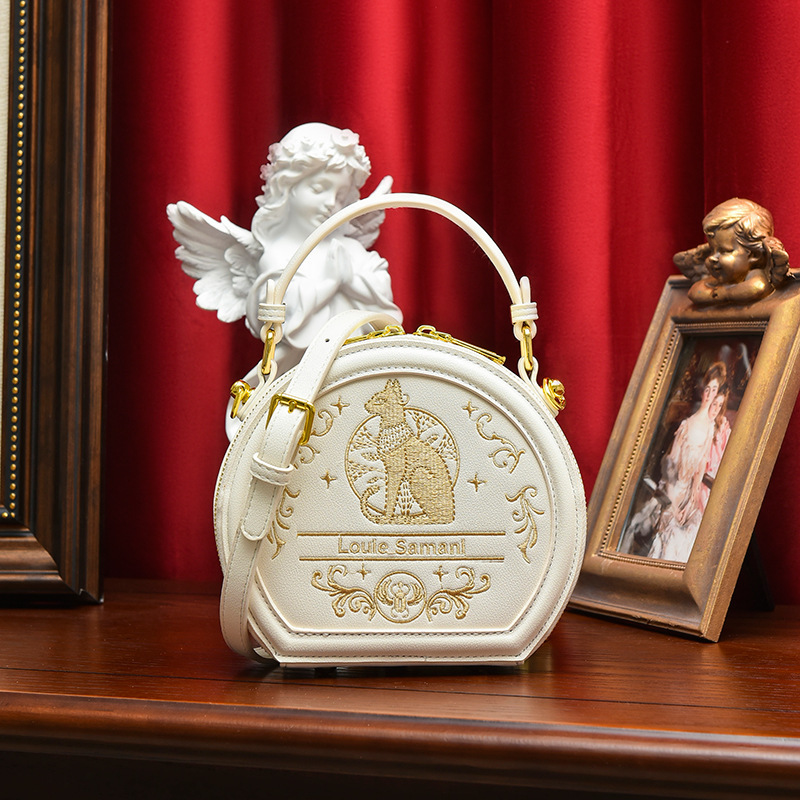 Niche bag women's creative women's round cake shoulder bag fashionable design embossed cat crossbody handbag