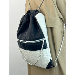Black and white contrasting color backpack 2024 new casual student class backpack female large capacity nylon chain bucket bag