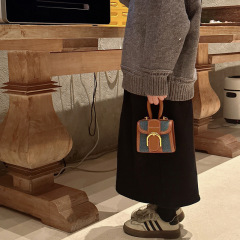 2024 season new Korean style plaid children's and girls' mini hand-held cross-body accessories small bags wholesale