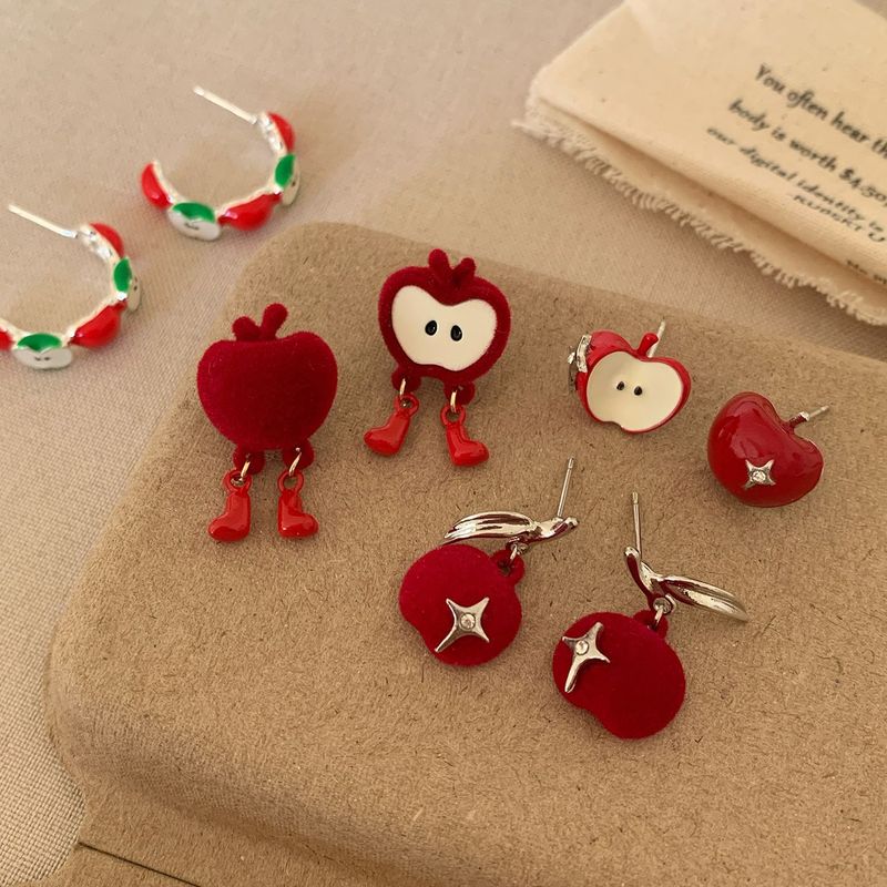 Autumn and winter flocked red apple funny earrings for women, silver needles, sweet and fun Christmas Eve cartoon temperament earrings