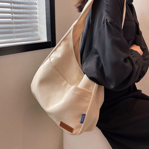 Simple large-capacity student tote bag spring new fashion simple shoulder bag portable casual class canvas bag