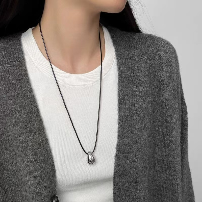 ins minimalist cold style metal pendant black leather rope necklace 2024 autumn and winter new high color retention long sweater chain