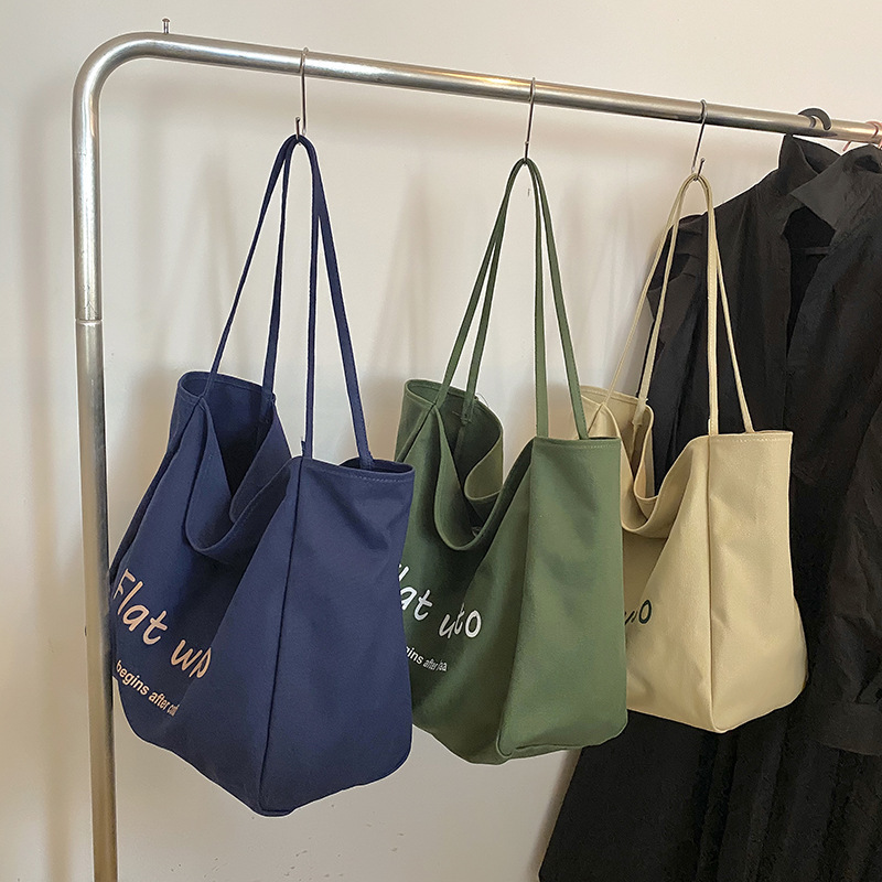Student casual large-capacity bag women's autumn new trendy fashion letter canvas bag Korean style shoulder cloth bag