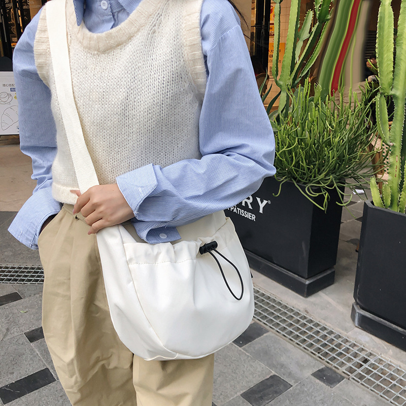 2024 new niche bags for women, large capacity drawstring design, single shoulder crossbody bag, popular commuter dumpling bag