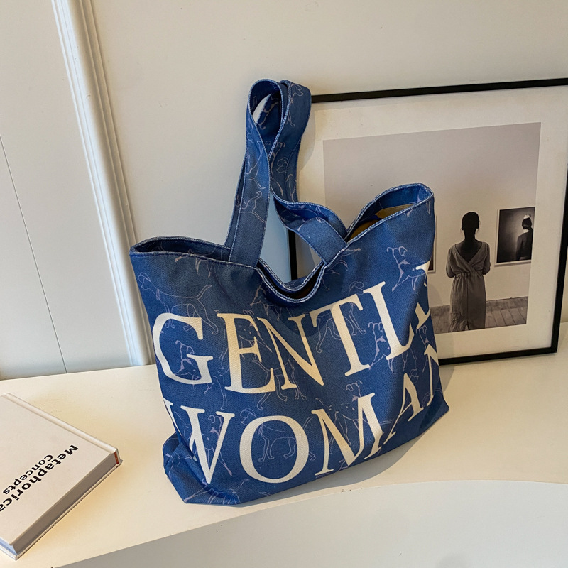 Large-capacity letter canvas bag for women in autumn and winter new style internet celebrity fashion shoulder tote bag outing portable shopping bag