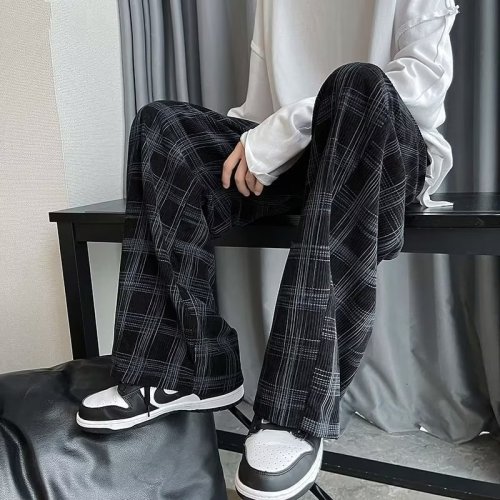 American high-street trousers for men with a drapey feel and a high-end sense of streetwear for men. Autumn thin, fashionable and handsome plaid wide-leg trousers.