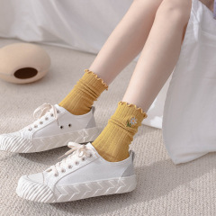 Japanese solid color black ears with small chrysanthemum embroidered mid-tube socks for women double needles piled socks