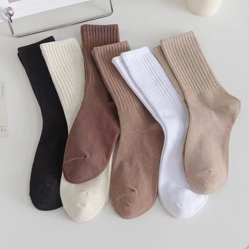 pile of socks for women solid color spring and autumn mid-tube socks summer white sports socks