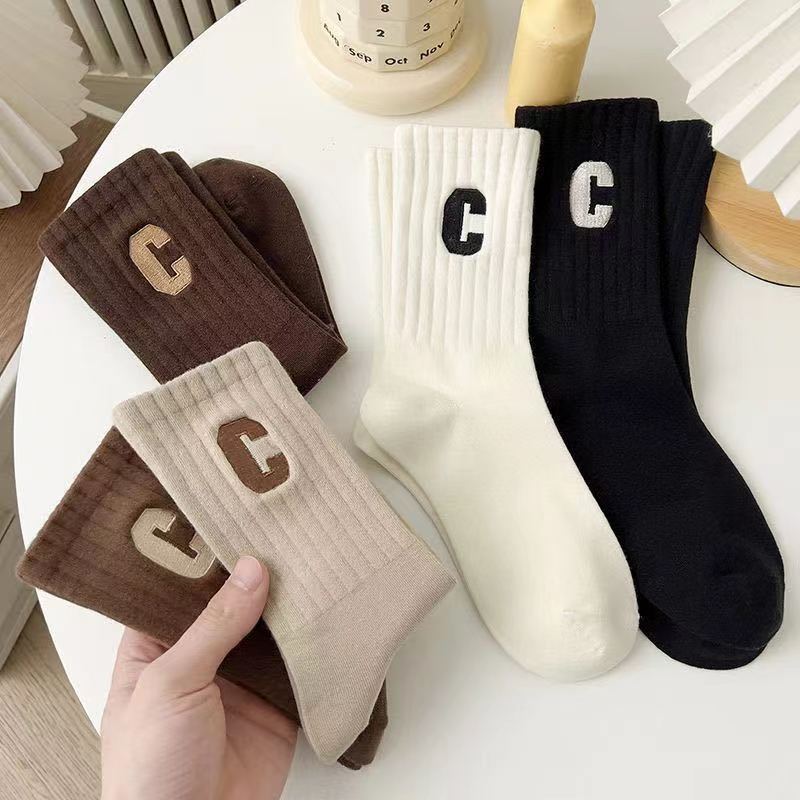 Socks for women ins trendy versatile letters medium long tube college style internet celebrity sports wear winter black stockings