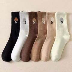 Socks for women in spring, autumn and winter medium socks solid color vertical pattern boneless sports sweat-absorbing stockings ins trendy stockings