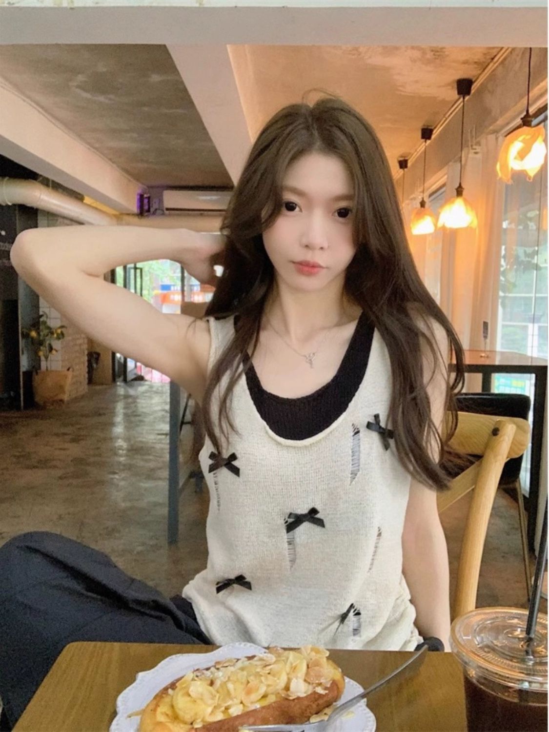 【5596 people collect】Fake two-piece bow ripped sweater for women in summer new sweet and spicy niche design short top for women