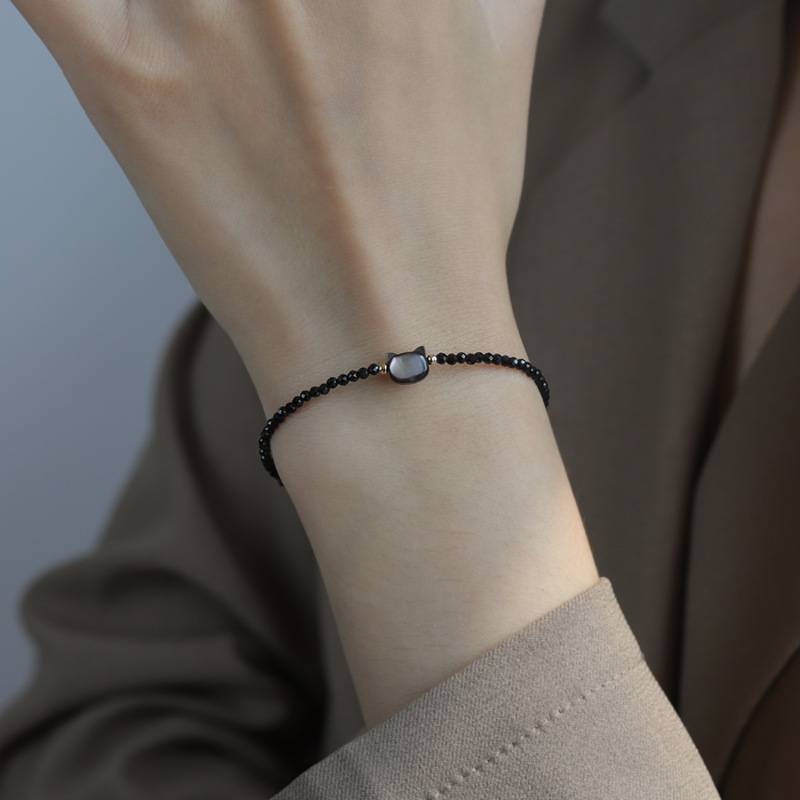 Korean new black and white cat bracelet adjustable imitation natural crystal small pearl black spine Japanese series