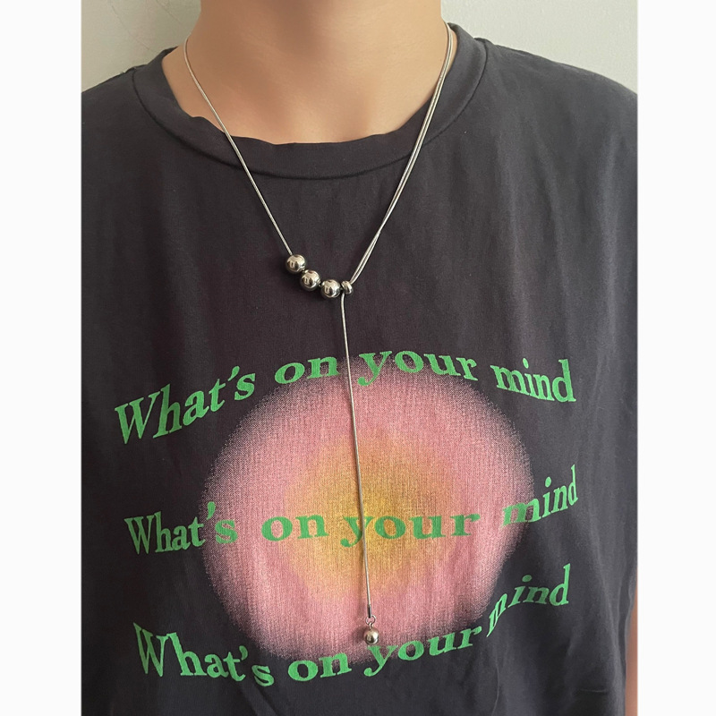 Round bead necklace stainless steel niche design high-end clavicle chain men's European and American cold style pull-out necklace for women