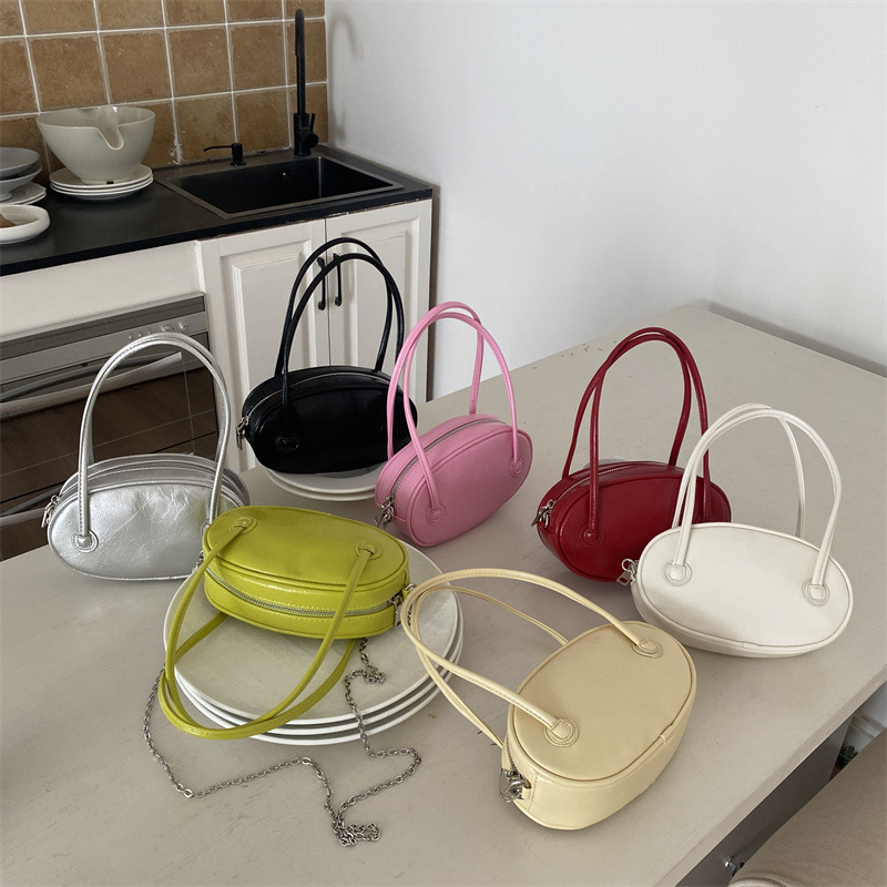 Korean version of women's bags niche single shoulder chain oval bag simple spring and summer handbag high-end fashion mobile phone bag