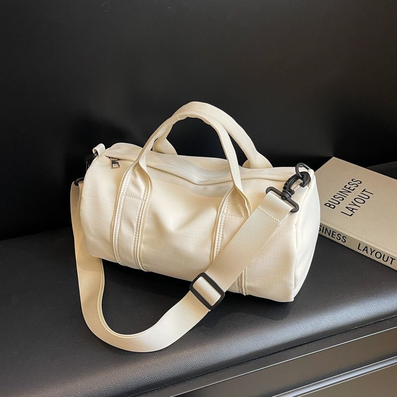 Korean white cylinder crossbody bag women's sports gym bag commuting toast bag shoulder bag casual carry pillow bag
