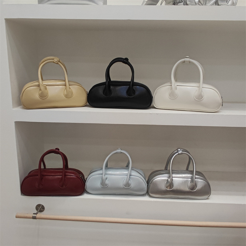 New niche high-end feeling simple solid color personality ins versatile Boston fashionable and fashionable hand-held crossbody women's bag