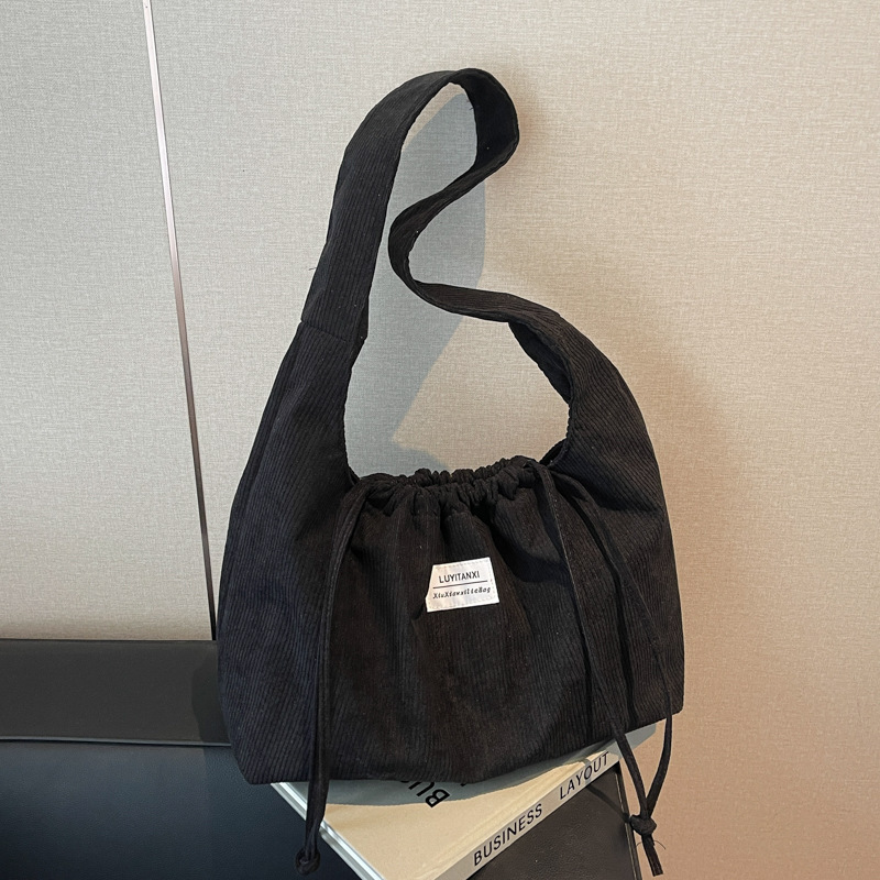 Large capacity fashionable drawstring shoulder bag spring new versatile ins casual bag armpit bag tote bag for women