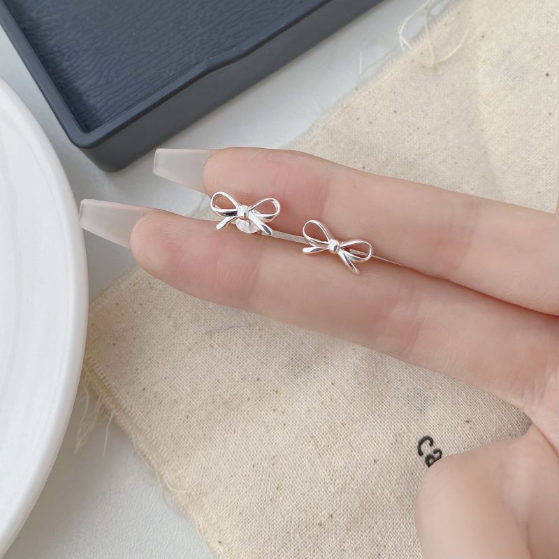 INS blogger design bow earrings 925 sterling silver earrings small mini versatile personality creative Korean version earrings