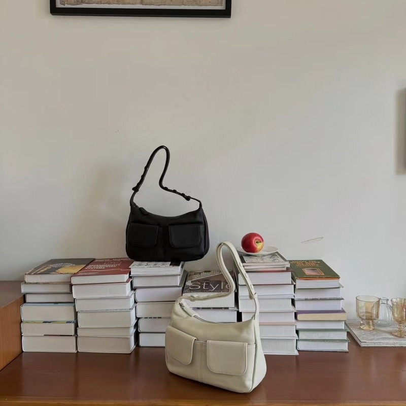 Korean version of niche bag for women's top layer cowhide retro double pocket underarm crossbody bag commuting bag