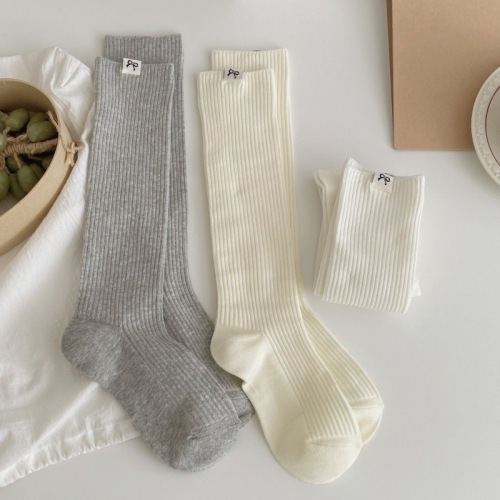 New Korean bow cloth label double needle socks for women's mid-long tube pile socks Korean simple calf socks white