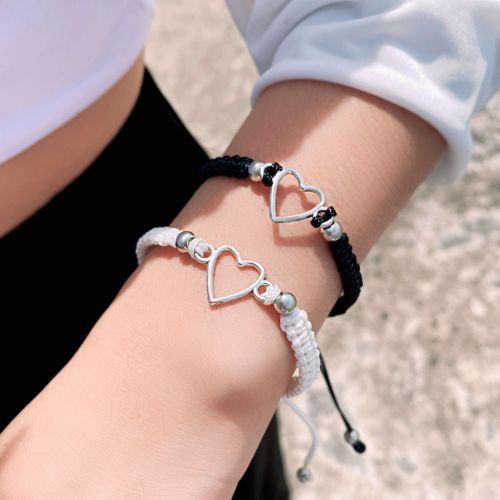 Creative couple black and white bracelet hollow love bracelet bracelet knitted push and pull bracelet pull bracelet adjustable bracelet
