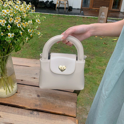Korean new niche design love lock handbag ins blogger same women's bag one-shoulder cross-slide bag