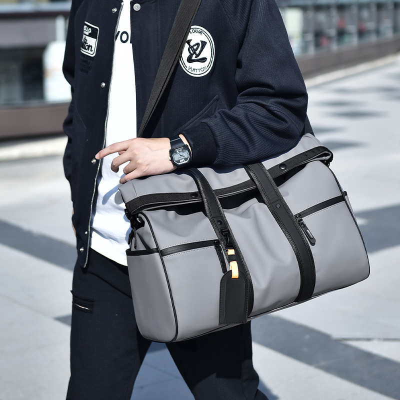 Men's large capacity waterproof shoulder bag business contrasting travel diagonal cross bag expansion travel hand luggage bag wholesale