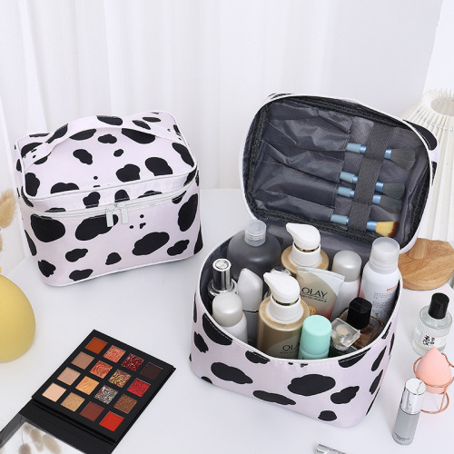 Manufacturer direct travel cute portable waterproof cosmetic storage bag large capacity ins Korean version cosmetic bag milk cow